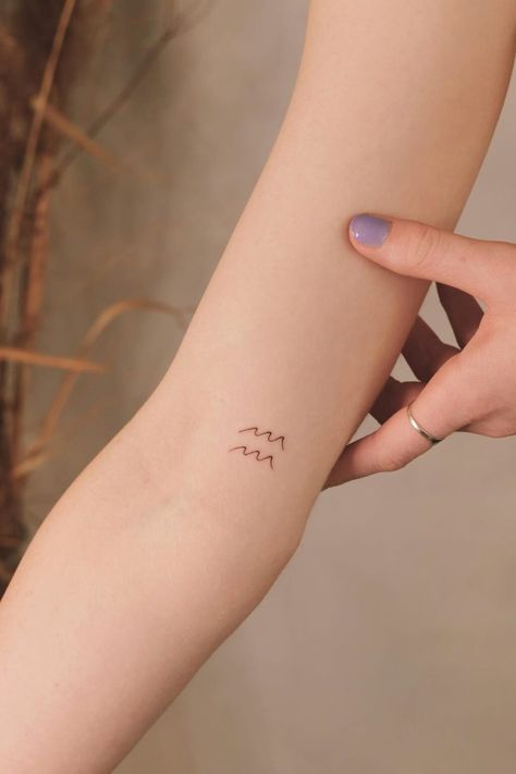 Aquarius Tattoo Glyph, Aquarius Simple Tattoo, Tiny Tattoo Locations, Aquarius Hand Tattoo, Aquarius Wave Tattoo, Minimalist Aquarius Tattoo, Aquarius Minimalist Tattoo, Small Aquarius Tattoo, Glyphs Tattoo