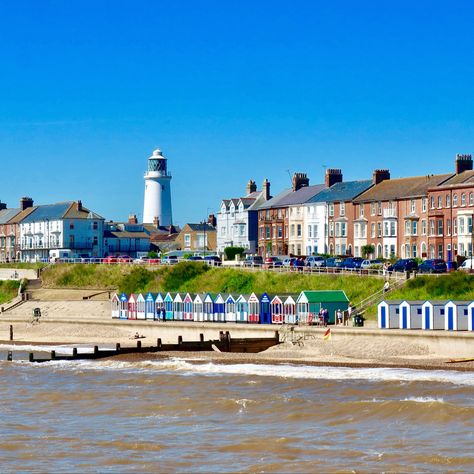 Colourful beach huts and the towering lighthouse in Southwold, Suffolk. John Constable, who is famous for his landscapes, used Suffolk as his inspiration. #Southwold #Suffolk #VisitBritain #EarlyTravel #Constable #Landscape #VisitSuffolk Southwold Suffolk, Lavenham Suffolk, Woodbridge Suffolk, England Seaside Town, Suffolk Coast, Norfolk England, Cornish Fishing Village, English House, Emerald Isle