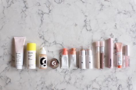 The Secret to a Simple (Yet Stunning) Makeup Routine, According to a Glossier Editor | The Everygirl Glossier Routine, Glossier Makeup Look, School Makeup Routine, Glossier You Discovery Kit, Glossier Fragrance, Glossier Makeup Kit, Makeup Capsule, Glossier Models, Glossier Skincare Kit