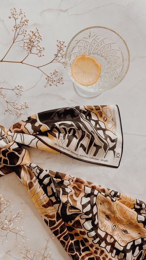 Scarf flat lay idea. African print scarf raising money for charity. Scarf Flatlay Photography, Scarfs Photoshoot Ideas, Scarf Photography Ideas Products, Scarf Photoshoot Ideas, Scarf Flatlay, Scarf Photography Ideas, Basket Balloon, Scarf Photoshoot, Cone Bouquet