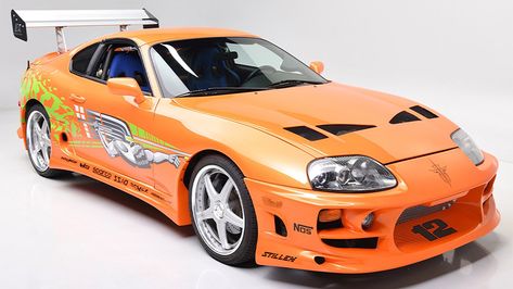 The 1994 Toyota Supra MK IV Will be auctioned off at Barrett-Jackson's annual Las Vegas sale in June. Supra From Fast And Furious, 1994 Supra, 1998 Toyota Supra, 1985 Toyota Supra, 1994 Toyota Supra Mk Iv, Skyline Gtr R34, Furious Movie, Toyota Supra Mk4, Mazda Rx 7