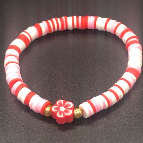 Read & See All Photos! Hand Crafted Flower Hawaiian Clay Bead Bracelet These Handmade Bracelets Are Stretchable So Will Fit Most Children’s And Adults Wrist Sizes Comfortably. Size: Os (7" Inch Stretchable Elastic) Multi Color: Red, Pink & White (Color May Vary Slightly Due To Lighting) ***Sold Separately*** Tags: #Christmasgift #Gift #Giftforhim Same/Next Day Shipping! Thanks For Stopping By My Poshmark Closet! Red Heishi Bracelet, Strawberry Clay Bracelet, Tennessee Clay Bead Bracelets, Light Pink Clay Bead Bracelet, Clay Bead Bracelet Aesthetic, Clay Bead Bracelet Ideas With Pearls, Clay Bead Bracelet Ideas Christmas, Clay Bracelets Diy, Clay Bead Bracelet Ideas Preppy