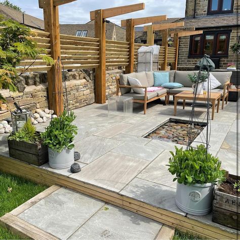 Kandla Grey sandstone paving is the most consistent natural Indian sandstone colour, making it the perfect choice for contemporary properties. Design a seamless yet natural-looking patio with our Kandla Grey paving slabs.  Of all the sandstone colours in our collection, Kandla Grey Indian sandstone paving slabs are the most popular. Due to their uniformity and consistency, they are ideal for those who don’t want too much colour variation for their outdoor space. Our Kandla Grey sandstone comes in a beautiful gentle grey-blue colour, with occasional beige shadings that appear. Patio Indian Sandstone, Sandstone Paving Slabs, Grey Paving, Indian Sandstone, Sandstone Paving, Sandstone Color, Colour Making, Coping Stone, Paving Slabs