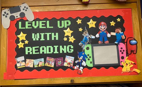 Video Game Bulletin Board Ideas, Video Game Bulletin Board, Game Bulletin Board Ideas, Teacher Door Decor, I Love To Read Month, School Decor Ideas, Board Game Themes, Book Fair Ideas, College Bulletin Boards