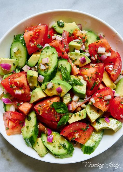 Delicious and addictive, this Tomato, Cucumber and Avocado Salad will make you prepare it again and again. Make it a few hours before serving - it will only get better. | cravingtasty.com Tomato Cucumber Avocado Salad, Cucumber And Avocado Salad, Craving Tasty, Cucumber Avocado Salad, Delicious Salad Dressings, Cucumber Avocado, Tomato Cucumber, Vegetable Peeler, Tomato Salad