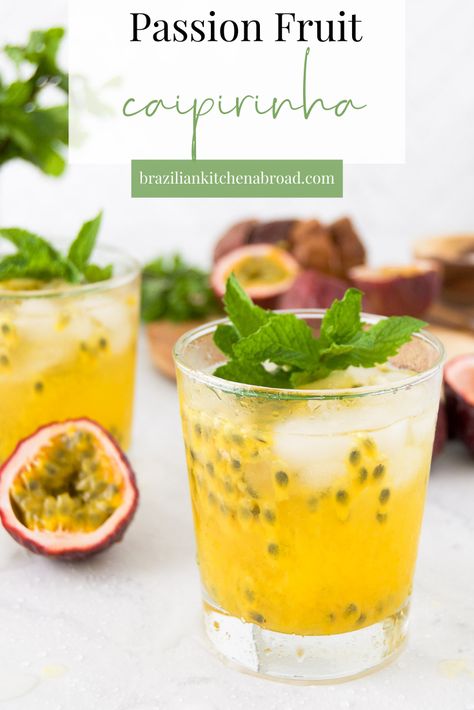 If you love the Brazilian national drink—the classic lime Caipirinha—you'll love this passion fruit version. This 3-ingredient passion fruit cocktail, called a Caipirinha de Maracuja in Portuguese, is sweet, tart and perfect for any time of the year. Like any other flavor of caipirinha, just pair this Passion Fruit Caipirinha with churrasco, grilled dishes, friends and fun, and you're all set for a memorable day full of the best tropical vibes. Recipe makes 2 servings, but is easily doubled. Passion Fruit Cocktail, Brunch Party Menu, Caipirinha Recipe, Brazilian Drink, Brazilian Cocktail, Yellow Passion Fruit, Caipirinha Cocktail, Homemade Brunch, Cordial Recipe