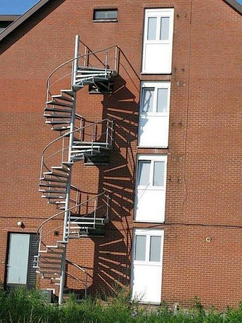 Don't Worry, There's an Emergency Staircase. Lol to add to that ,I first noticed that it look like a DNA pattern ,not that the doors were off Funniest Fails Ever, Architecture Fails, Job Memes, Job Fails, Construction Fails, You Had One Job, Design Fails, Fire Escape, Leyte