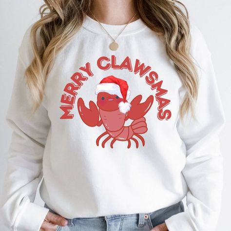 This awesome Cajun Christmas shirt is the ultimate holiday season outfit to wear during the entire winter season. The fun eye catching design of this Louisiana Christmas shirt makes it the perfect Cajun Christmas sweatshirt for every occasion during the holidays. This Ugly Xmas sweater will be an amazing Christmas present for you and everyone you know in your circle of friends and acquaintances. This Merry Clawsmas Crawfish sweatshirt is sure to be a show stopper and a conversation starter. Cajun Christmas, Louisiana Christmas, Crawfish Shirt, Ugly Xmas Sweater, Circle Of Friends, Xmas Sweater, Youth Hoodies, Sweater Design, Christmas Present