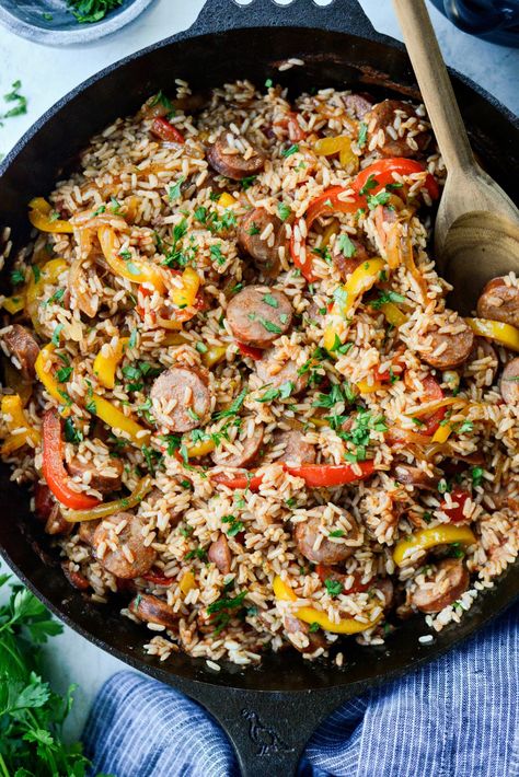 Andouille Cajun Rice Skillet - Simply Scratch Andouille Sausage Recipes, Rice Skillet Meals, Cajun Rice, Sausage Jambalaya, Sausage Rice, Sauteed Peppers And Onions, Sauteed Peppers, Rice Skillet, Iron Recipes