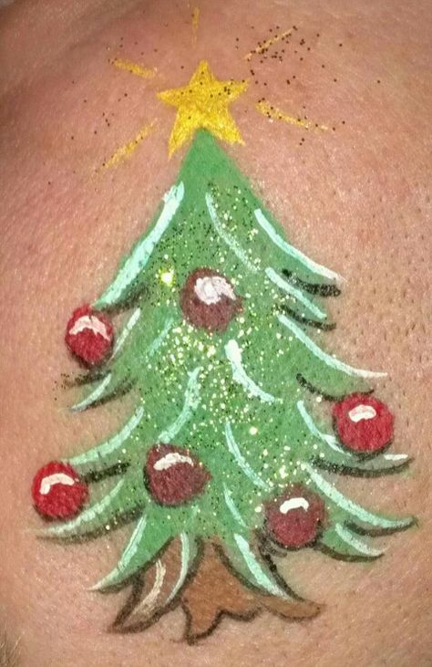 My first face paint Christmas tree. Tree Face Paint, Christmas Face Painting Ideas, Face Paint Christmas, Paint Christmas Tree, Face Painting Ideas, Christmas Face Painting, Paint Christmas, Cheek Art, Reindeer Face