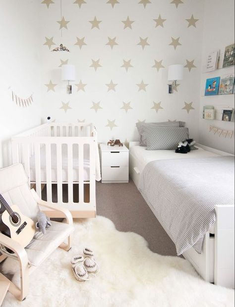 Simply toddler and baby shared room with stars on one wall Baby And Toddler Shared Room, Toddler And Baby Room, Kids Rooms Shared, Shared Girls Room, Kids Shared Bedroom, Shared Girls Bedroom, Shared Kids Room, Storage Kids Room, Shared Bedroom