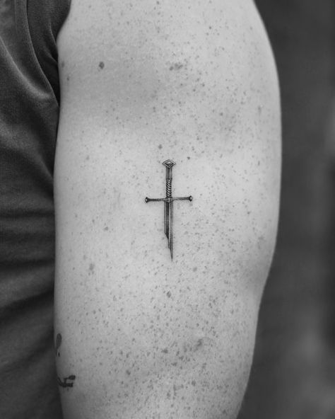 Swords for ever. Thanks Guy . . #lotrtattoo #finelinetattooing #narsil #lotrart #microtattoo Small Lotr Tattoo Simple, Boromir Tattoo, Narsil Lotr, Aragorn Tattoo, Lord Of The Rings Tattoo Minimalist, Lotr Tattoo Minimalist, Small Lotr Tattoos, Lotr Tattoo Ideas, Evenstar Tattoo