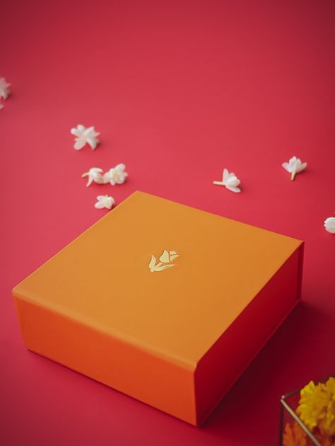 Utsav collection celebrates the traditional Indian hues with a contemporary appeal. Boxes and bags in premium velvet finish paper with gold motif and self texture patterns. The set can be customised as per the sizing and personalisation requirement.
#gifts #packaging #weddinggifts #corporategifts #celebrations #packaging #design Sweet Box Design, Gold Motif, Orange Tulips, Sweet Box, Indian Sweets, Gift Hampers, Traditional Indian, Box Design, Paper Texture