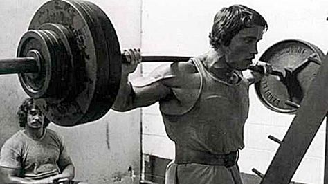 An Olympic barbell is the quintessential piece of weightlifting gear, and even those who’ve never worked out have images of powerful men and women hoisting bars loaded with massive weights over their heads at the Olympics. Arnold Swarzenegger, Arnold Workout, Arnold Bodybuilding, Arnold Schwarzenegger Bodybuilding, Schwarzenegger Bodybuilding, Training Motivation, Building Muscle, Golds Gym, Gym Memes