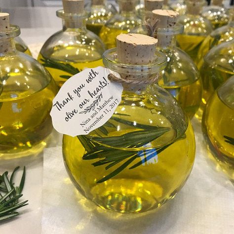 "This beautiful custom order is now available for your olive oil favors. I love how simple and beautiful it is. The Details: *Measures 1.7\" x 1.2\" *Sold in sets of 18 *Available on white or ivory 110# index cardstock *Print in black or color When ordering please include: *Couple's Names *Event Date To keep production times down, a digital proof is not sent. If you would like to see your order before I print, I would be happy to send a proof. Please request one in the notes to seller at checkou Olive Oil Bridal Shower Favors, Make Your Own Olive Oil Bar, Olive Bridal Shower Ideas, Olive Wedding Theme Decor, Olive Theme Party, Italian Party Favors, Olive Theme Wedding, Mediterranean Wedding Decor, Olive Wedding Theme