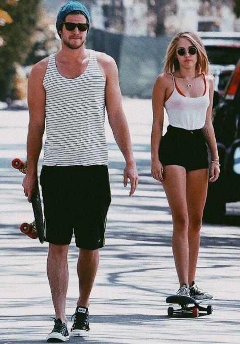 Miley Cyrus . Liam Hemsworth Miley Cyrus Outfit, Miley And Liam, Miley Cyrus Style, Skate Girl, Black High Waisted Shorts, Red Bra, Wearing Sunglasses, Liam Hemsworth, Hannah Montana