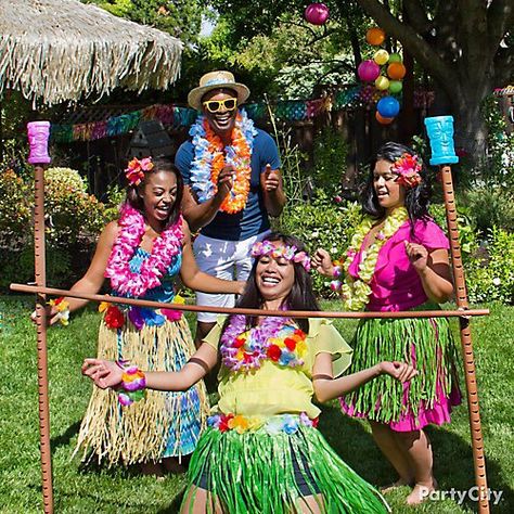 Totally Tiki Luau Party Ideas | Party City Adult Luau Party, Hawai Party, Grass Skirts, Hawaii Themed Party, Watercolor Party, Luau Decorations, Hawaii Theme, Hawaiian Party Theme, Fest Temaer