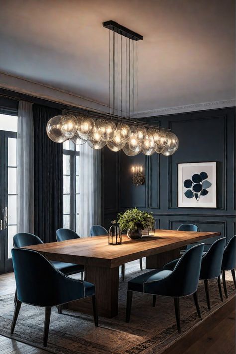 Modern, minimalist dining room with sleek pendant lighting Chic Modern Dining Room, Luxury Dining Room Lighting, Dining Table Chandeliers, Dining Table With Chandelier, Modern House Dining Room, Over Dining Table Lighting, Dinner Table Lighting, Dining Area Decor Ideas, Dining Room Decor Modern Classy