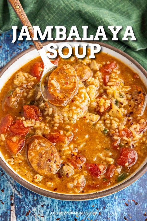 This jambalaya soup is comforting and delicious, loaded with smoky andouille sausage, juicy chicken, and rice, big flavors in a single pot! Easy to make with shrimp, too. Andouille Soup Recipes, Andouille Recipes, Andouille Sausage And Rice, Jambalaya Soup Recipe, Jambalaya Soup, Andouille Sausage Recipes, Chicken Sausage Recipes, Gumbo Soup, Homemade Cajun Seasoning