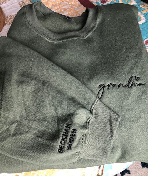 Excited to share the latest addition to my #etsy shop: Personalized Grandma,Custom Pocket and Sleeve Embroidered Sweatshirt,Embroidered Grandma Crewneck, Grandmother Sweatshirt with Kids Name https://etsy.me/3GolJgw #personalizedgrandma #embroidered #giftkidsnames Grandma Sweater, Personalized Grandma, Embroidered Crewneck, Personalized Clothes, Embroidered Sweatshirt, Embroidery Ideas, Embroidered Sweatshirts, Fitted Sweater, Look Plus