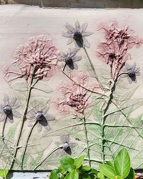 I just pulled the plaster cast of hand-tinted flowers and fern from the clay mold. Now, I'll finish the edges and let the plaster dry before sealing it with an acrylic varnish that will help protect it from moisture and UV light. #plasterart #botanical #botanicalart #flowerart #homedecor #botanicalbasrelief #botanicalplastercast #flowercasting #plastercast #walldecor #farmhousedecor #wildflowers #wallhanging #homedecor #wallart #art #hangingart #interiordesign #ceramics #oneofakind #plaster ... Acrylic Varnish, Plaster Cast, Bouquet Preservation, Plaster Art, Molding Clay, How To Preserve Flowers, Uv Light, Hanging Art, Botanical Art