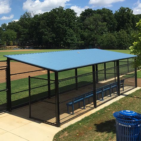 GameShade® Dugouts | Sportsfield Specialties Baseball Facility Design, Baseball Dugout Ideas, Diy Baseball Field, Dugout Lineup Board, Baseball Field In Backyard, Dugout Ideas, Flat Metal Roof, Baseball Training Facility, Softball Dugout