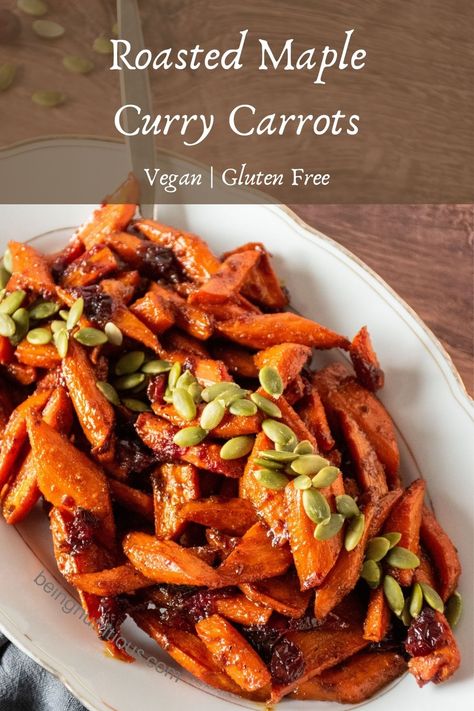 Roasted Maple Curry Carrots are a delicious, familiar, yet unique side dish for your holiday gathering. Easy enough for a weeknight, but feels so fancy. They'll have everyone saying pass the carrots please! Curried Carrots, Curry Carrots, Carrot Casserole, Unique Side Dishes, Pineapple Curry, Carrot Recipe, Vegan Feast, Maple Glazed Carrots, Glazed Carrots Recipe