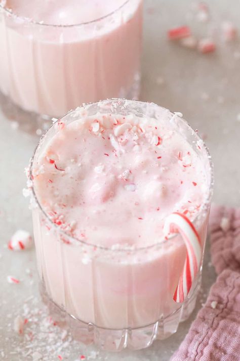 This candy cane Christmas punch is not only delicious but also so quick and easy to make! The combination of eggnog and peppermint works wonderfully and it looks so festive too! #ChristmasPunch #PeppermintPunch Mint Christmas Cocktail, Peppermint Christmas Party, Recipe With Eggnog, Festivus Party, Ice Cream Punch, Xmas Drinks, Peppermint Ice Cream, Christmas Summer, Christmas Punch Recipes