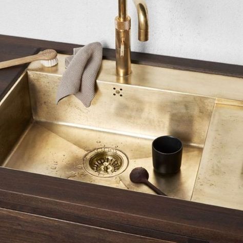 The kitchen sink: one of the most utilitarian objects in any home. Unless, of course. it’s brass. The gold-coloured credentials of this wonderful metal add instant richness to a room, whatever the style. Modern and minimalist, timeless and traditional – all benefit from the addition of a little brass. Scroll through these sumptuous examples and […] Brass Kitchen Sink, Metal Sink, Vintage Style Kitchen, Brass Interior, Brass Kitchen, Kitchen Sinks, Remodel Bedroom, Kitchen Pantry, Kitchen Styling