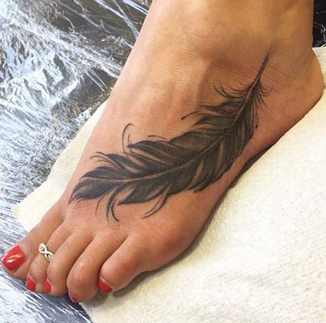 Black Feather Foot Tattoo Ideas at MyBodiArt.com Tattoo Plume, Tattoo On Foot, Feather Tattoo Meaning, Pawprint Tattoo, Feather Tattoo Design, Snakebites, Foot Tattoos For Women, Feather Tattoo, Subtle Tattoos