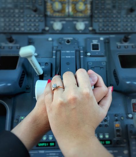 Pilot wife, engagement pictures, aviation themed, co-pilot, rose gold ring, solitaire. Loved going on a trip to California with my fiancé to take this picture! Pilot Wedding Photography, Pilot Love Couple, Pilot And Doctor Couple, Aviation Engagement Photos, Pilot Husband Aesthetic, Pilot Couple Aesthetic, Pilot Proposal, Pilot And Flight Attendant Couple, Pilot Wedding Ideas