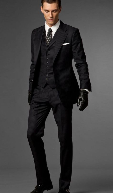 I love the gloves with the black on black pin stripe suit. Very modern. Casual Summer Wedding Attire, Men Work Outfits, Tuxedo Wedding Suit, Groomsmen Tuxedos, Tie Vest, A Man In A Suit, Man In A Suit, Wedding Suits Groom, Designer Suits For Men