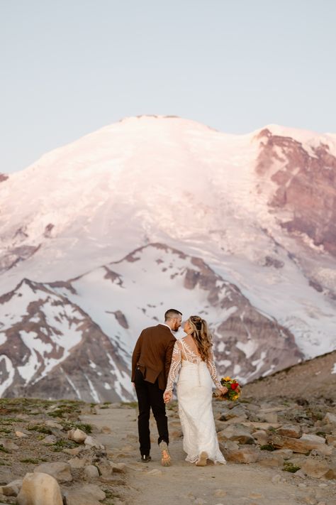 Imagine saying 'I do' as the first rays of sunlight hit Mount Rainier. Watching the sun rise and the mountain turn pink while exchanging your vows is a beautiful and unique way to get married! If you love what you see, click the link below and see what your mountain elopement in the PNW could look like if captured by me! #SunriseVows #MountRainierElopement. #LoveAtSunrise #MountainElopement #washingtonelopement #mtrainierelopementphotographer #sunrisemountainelopement #pnwelopement Washington Mountains, Mt Rainier National Park, North Cascades National Park, Rainy Wedding, Rainier National Park, National Park Wedding, Breathtaking Wedding, Mountain Elopement, Beautiful Sunrise