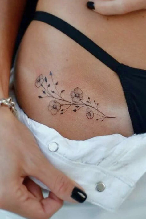 The 10 Most Sexy Hip Tattoos That Will Make Your Jaw Hit The Floor! 
#HipTattoos #TattooDesigns #InkInspiration #BodyArt #TattooIdeas #HipTattooIdeas #TattooTrends #InkedUp #ArtisticInk #TattooLove #CreativeTattoos #UniqueDesigns Small Tattoo Hips Women, Dainty Hip Tattoos Women, Hip Flower Tattoo, Tattoo On Private Part, Lil Tattoos, Flower Hip Tattoos, Hip Tattoo Designs, Hip Tattoos, Phrase Tattoos