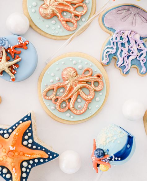 I don’t care what the question is. Custom sugar cookies are the answer. We loved creating this under the sea collection for @oneinspired! #fish #ocean #wildlife #saltlife #sea #boat #underwater #sailing #aquarium #earthandsugar #thesweetlife #palmbeachcakery #palmbeach #cookies #delicious #customcookies #cookiedecorating #sweet #cookiesofinstagram #octopus #starfish #sugar #sugarcookies #bakeitbetter #miami #sealife #baking #dessert #yummy #underthesea Octopus Cookies, Royal Icing Decorated Cookies, Beach Cookies, Octopus Tentacles, Custom Cookies, Royal Icing, Beach Themes, Starfish, Octopus