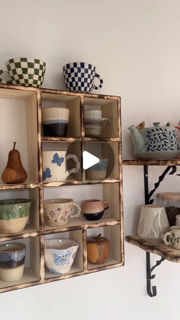 Petra on Instagram: "My updated mug display ☕️ 
The collection grew by a few members (gorgeous charity shop finds) these last couple weeks so it was time for a new shelf; burnt around the edges to match the theme I‘ve got going on 🔥🪵
.
.
.
#mugdisplay #mugshelf #ceramics #mugsmugsmugs  #mugsofinstagram #healthyobsessions #handmademugs #charityshopfinds #charityshopfind #hiddentreasures #smallcollection #mugcollection #mugcollector" Mug Display Ideas, Mug Display Shelf, Mug Collection Display, Mug Shelf, Charity Shop Finds, Mug Display, Apartment Goals, Collection Display, Mug Collection