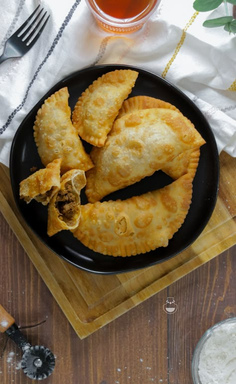 Dominican Style Beef Empanadas made with savory and tasty stewed ground beef and the perfect empanada dough! Beef Empanadas Recipe Puerto Rican, Dominican Empanadas Recipe, Pastellios Recipe, Best Flan Recipe, Empanadas Recipe Dough, Dominican Style, Beef Empanadas Recipe, Empanada Dough, Empanadas Dough