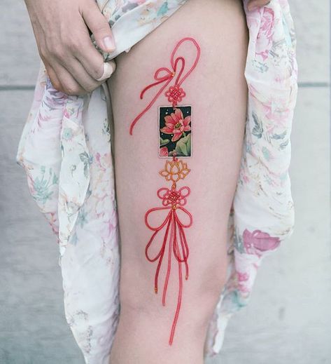 lotus flower norigae embroidered along the side of her leg *Norigae= Korean traditional ornaments.#tattooistsion Norigae Korean, Japanese Tattoo Symbols, Korean Tattoos, Asian Tattoos, Traditional Ornaments, Tatuaje A Color, Japanese Tattoo Designs, Korean Traditional, Symbolic Tattoos