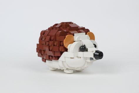 LEGO builder Hejjo Demkowicz asked friends what they want built and the masses demanded a hedgehog. Nice! Lego Animals, Lego Diy, Lego Builder, A Hedgehog, Lego Models, Cool Lego, Lego Creations, Some Ideas, Piggy Bank