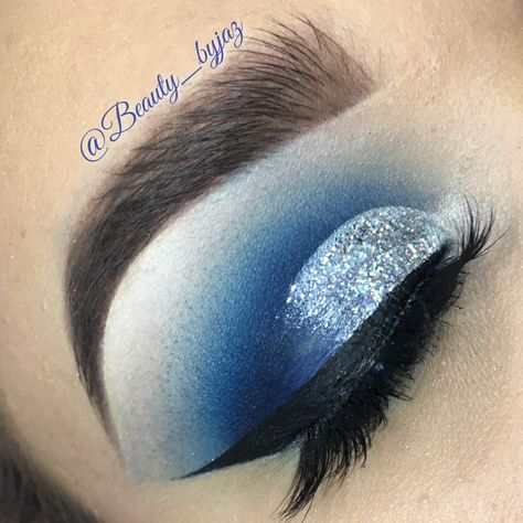 Bright blue and silver  cut crease silver glitter follow ig: beauty_byjaz Blue And Silver Makeup, Blue Cut Crease, Best Black Eyeliner, Maquillage Yeux Cut Crease, Eye Makeup Cut Crease, Blue Eyeshadow Looks, Cut Crease Eye, Silver Makeup, Baked Eyeshadow