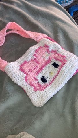 My melody bag 💖🤍 My Melody Crochet Grid, Crochet Hello Kitty Bag, Crochet My Melody, My Melody Crochet, Hello Kitty Crochet, Hello Kitty Bag, Crochet Purse Patterns, Crochet Tapestry, Purse Patterns