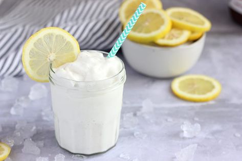 frozen lemonade in glass with lemon slice Frosted Lemonade Chick Fil A, Frosted Lemonade Recipe, Simply Lemonade, Frosted Lemonade, Copycat Chick Fil A, Homemade Lemonade Recipes, Pimento Cheese Recipes, Lemon Ice Cream, Vanilla Milkshake