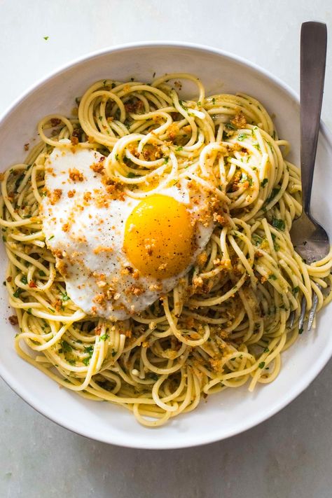 This interactive pasta dish (each diner creates their own “sauce” by breaking the yolk of the fried egg that sits atop the pasta) can be made with pantry ingredients and comes together in less than an hour. Eggs And Bread, Anchovy Pasta, Perfect Fried Egg, Lamb Steaks, Kale Pasta, Egg Pasta, America's Test Kitchen, Cooks Illustrated, Avocado Tomato