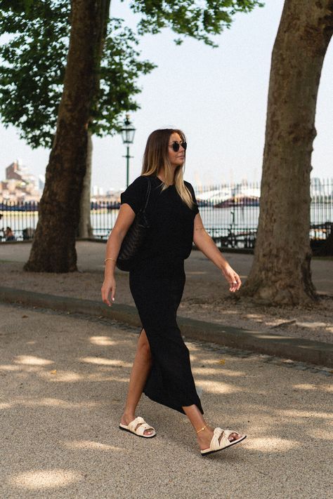 Emma Hill wears black dress, Dragon Diffusion Nantucket woven leather tote bag, Dear Frances Tye slides sandals. chic Summer outfit Black Slides Outfit, Slides Outfit Summer, Slide Sandals Outfit, Black Summer Outfits, Emma Hill, Jamaica Outfits, Dragon Diffusion, Slides Outfit, Wear Black Dresses