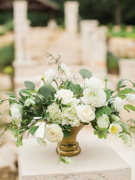 Gorgeous, white, neutral floral arrangement in a gold vase.  Perfect for the grand entrance to your ceremony site! Taken at THE SPRINGS Event Venue in Aubrey, TX.  Book your free tour today! Classic Wedding Centerpieces, Cheap Wedding Table Centerpieces, Peonies Centerpiece, Winter Wedding Colors, Pink Garden, Pink And White Flowers, Classic Southern, Wedding Table Centerpieces, Floral Centerpieces