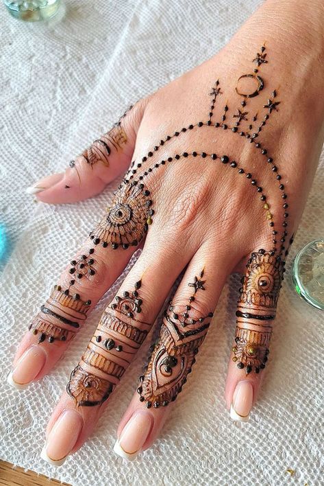 henna designs, celestial henna designs, moon henna designs, henna ideas, star henna designs, galaxy henna designs, henna design ideas Mehendi Moon Designs, Eid Mehndi Designs Moon And Stars, Moon And Star Henna Designs, Mehndi Designs Moon And Stars, Moon Mendhi Designs, Henna Design 2024, Easy Simple Henna Designs For Eid, Moon And Star Mehndi Design, Eid Henna Moon