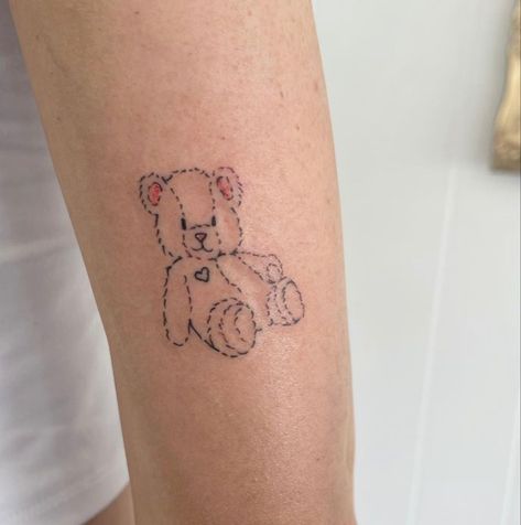 Tattoos On V Line Women, Tattoo Ideas Teddy Bears, Teddy Bear With Bow Tattoo, Vintage Teddy Bear Tattoo, Koda Bear Tattoo, Bear Face Tattoo Simple, Teddy Bear Holding Flowers Tattoo, Childhood Bear Tattoo, Stuff Animal Tattoo