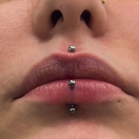 This medusa and vertical labret combo is the perfect choice for two for Tuesdays! Buy one piercing and get the second half off!☺️  Pierced by @alexpokes   Soho, Union Square, and Williamsburg  11AM-9PM 7 DAYS A/W🕘 WALK-INZ OR BOOK ONLINE..📕 TATTOOS & PIERCINGS, NO ATTITUDE, NO MISERABLE HOOPS TO JUMP THROUGH....🚫 WALK-INZ WELCOME OR BOOK ONLINE AT ⚔️livebytheswordtattoo.com⚔️ . . . . #livebythesword #medusapiercing #verticallabret #lippiercing #lippiercings Vertical Medusa Piercing, Medusa And Vertical Labret Piercing, Piercing Medusa, Vertical Labret Piercing, Vertical Labret, Piercing Inspo, Medusa Piercing, Cool Piercings, Labret Piercing