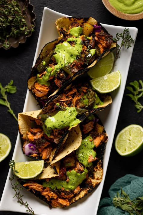 Jerk Salmon Tacos + Avocado Cilantro Lime Sauce Jamaican Jerk Salmon, Jerk Fish Tacos, Healthy Spicy Dinner Recipes, Jerk Salmon Tacos, Jamaican Tacos, Jerk Salmon Recipe, Jerk Tacos, Fish Tacos Recipes, Mexican Salmon