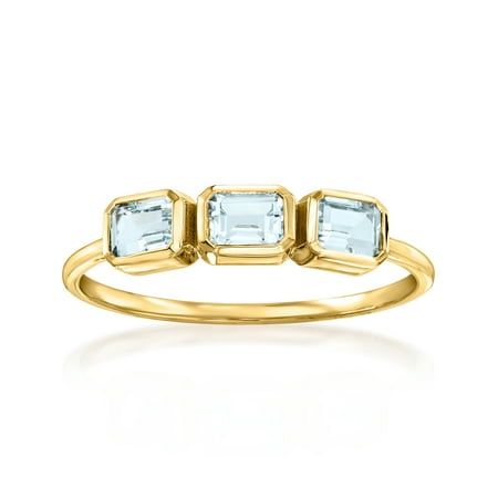 A trusted jeweler in 1952, Ross-Simons is dedicated to quality and value. RS Pure. Modern designs that complete your outfit and complement your personality. A simple take on the classic three-stone style, this dainty ring shimmers with .70 ct. t.w. emerald-cut aquamarines in glossy 14kt yellow gold. Wear it solo or stacked! 1/8" wide. Aquamarine three-stone ring. Each Ross-Simons item arrives in a fine jewelry presentation box. Shop Ross-Simons jewelry risk-free as all items include a 30-day, 100% money-back guarantee. Stone Information Gem Type 1: Aquamarine Stone Cut 1: Good-Cut Stone Color 1: Blue Stone Clarity 1: Blue Stone Shape 1: Emerald-Shape Stone Creation Method 1: Natural Stone Treatment Method 1: Heat-Treated Stone Weight 1: 0.70 Carats Number Of Stones 1: 3 Gender: female.  Ag March Birthdays, Diamond Anklet, Italian Gold Jewelry, Aquamarine Birthstone, Pearl Bracelet Gold, Pearl Strands Necklace, Aquamarine Colour, Fine Jewelery, Precious Gemstones Jewelry